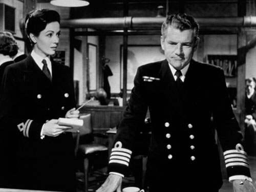 Dana Wynter and Kenneth More try to second-guess the Germans. Image: flammentanz.tumblr.com